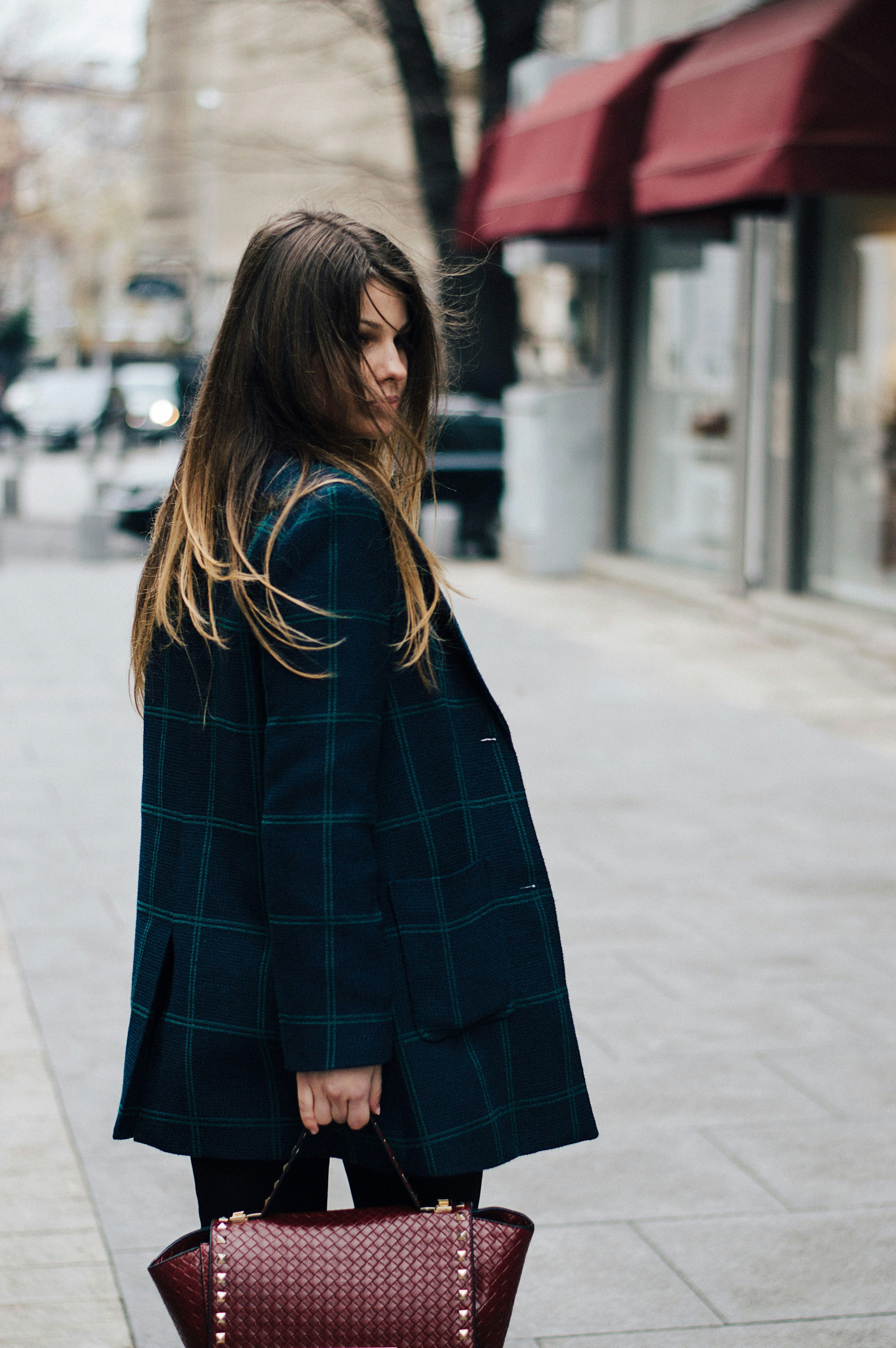 Silk blend blouse in black, styled with trousers
